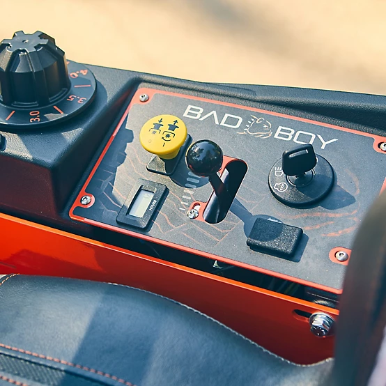 Control panel with 'Bad Boy' branding on a mechanical device.

