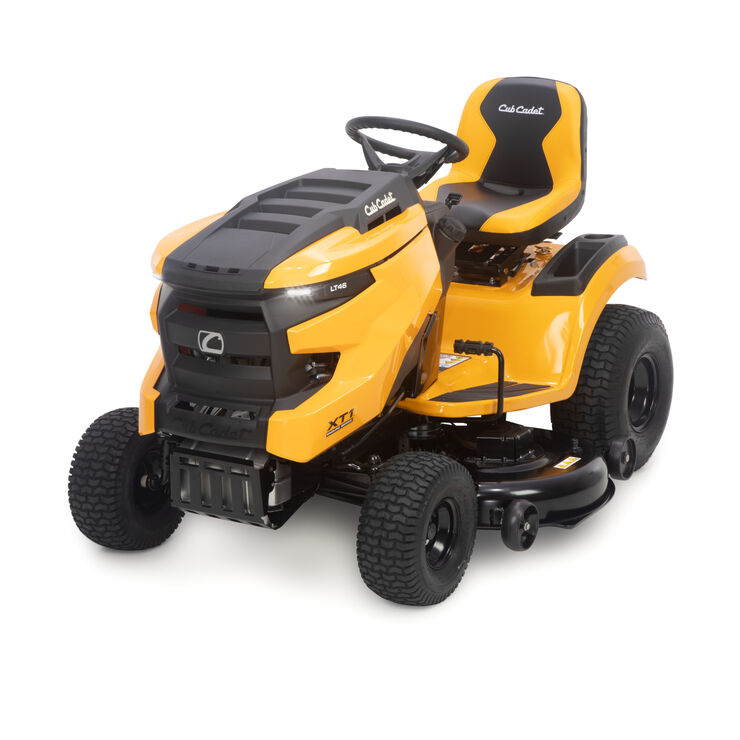 Yellow and black Cub Cadet lawn mower on a white background
