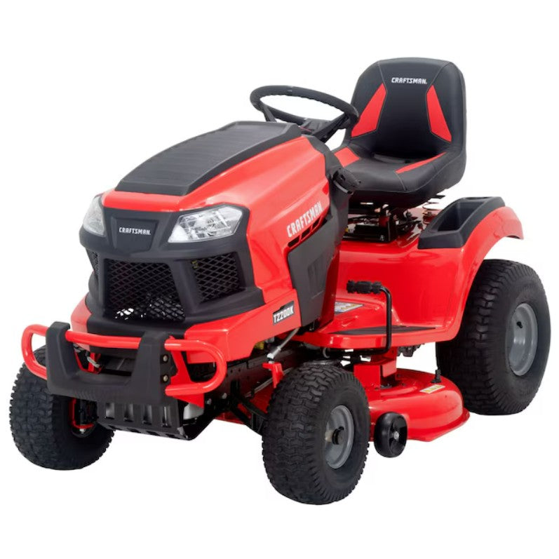 Red riding lawn mower with black seat on a white background

