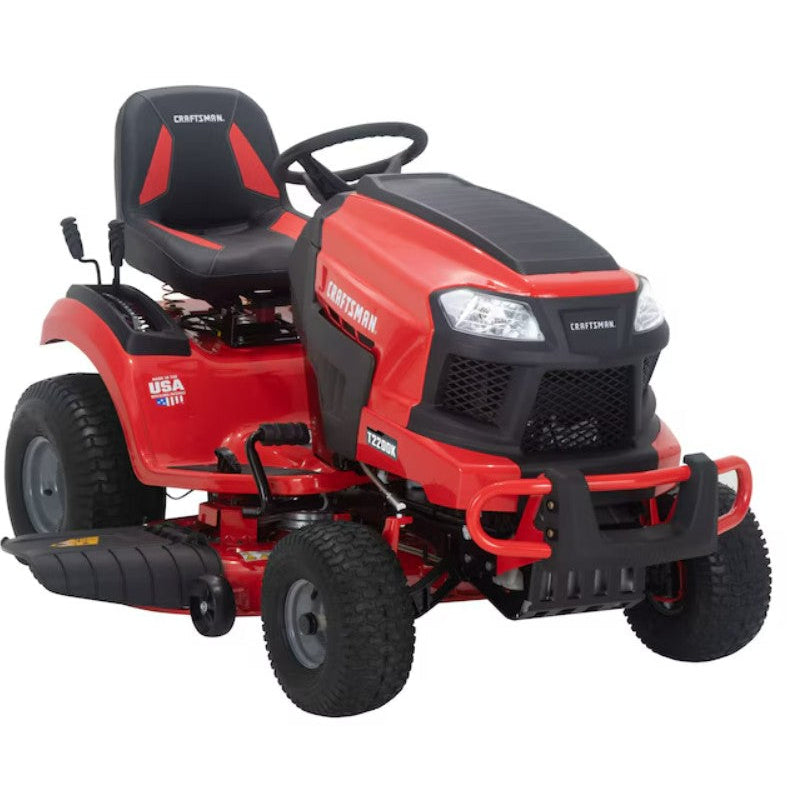 Red riding lawn mower on a white background

