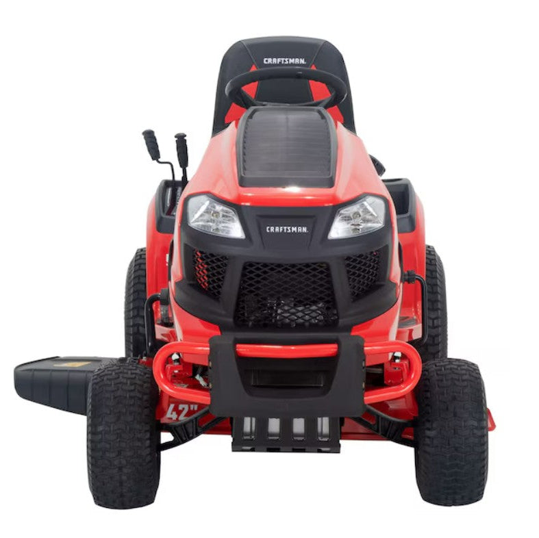 Red riding lawn mower with black seat on a white background

