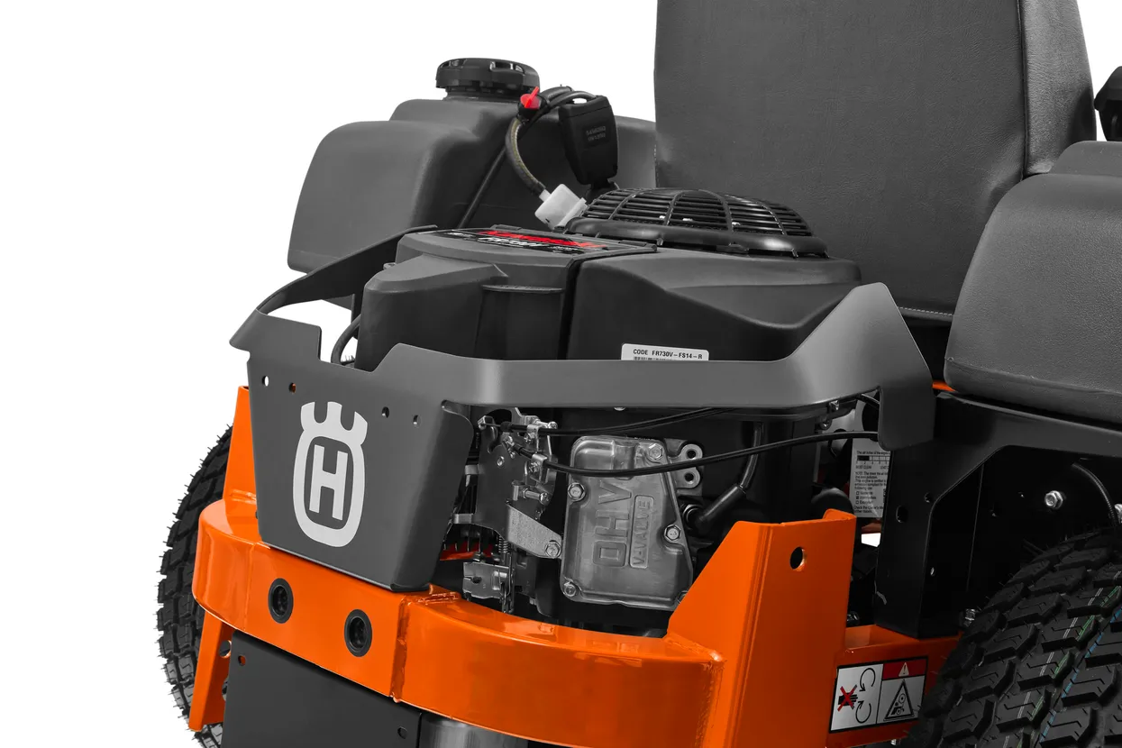 Close-up of a Husqvarna riding lawn mower on a white background

