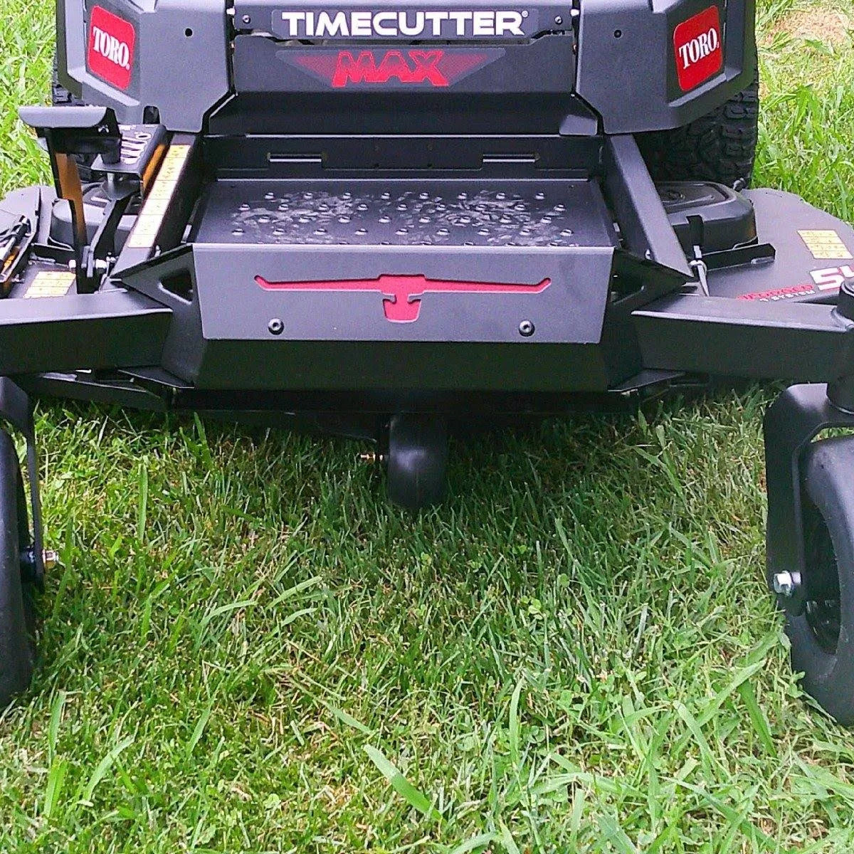 Mower with 'Timecutter' branding on a grassy background

